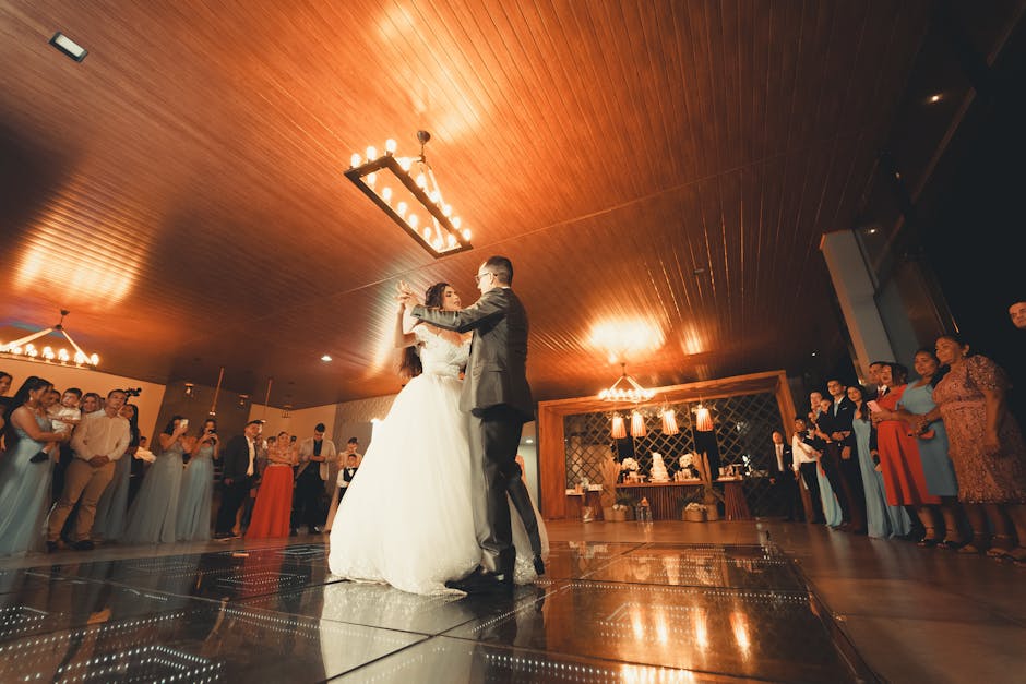 A couple sharing their first dance at the wedding reception